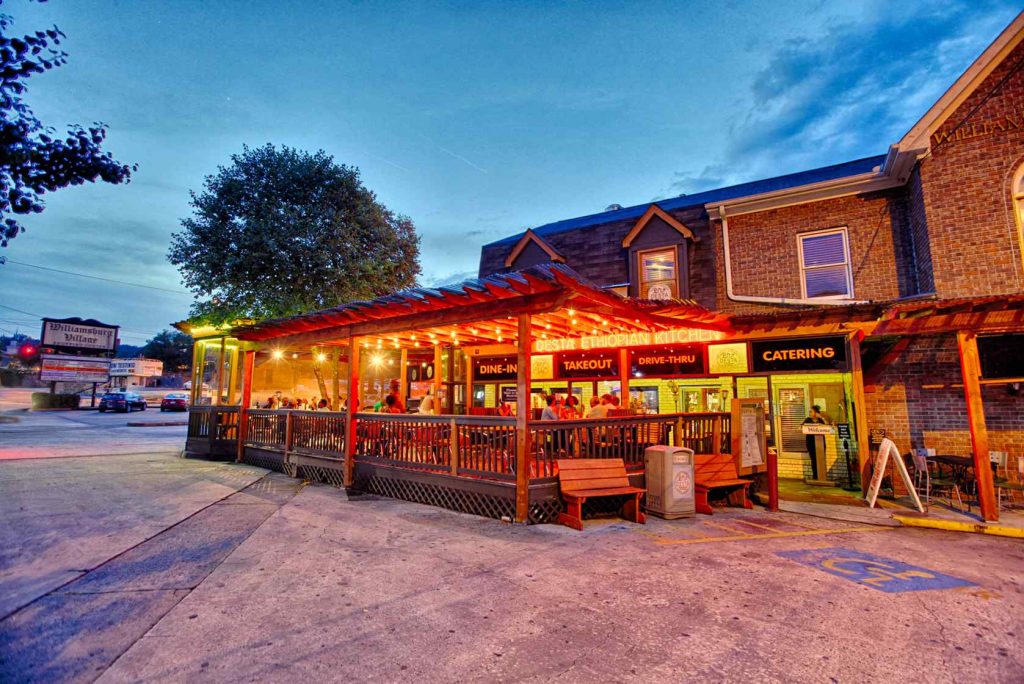 Exterior shot of well lit, shack style restaurant at Desta Ethiopian Kitchen