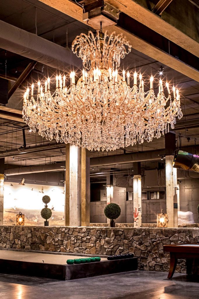 Close up shot of a chandelier lighted restaurant at The Painted Duck