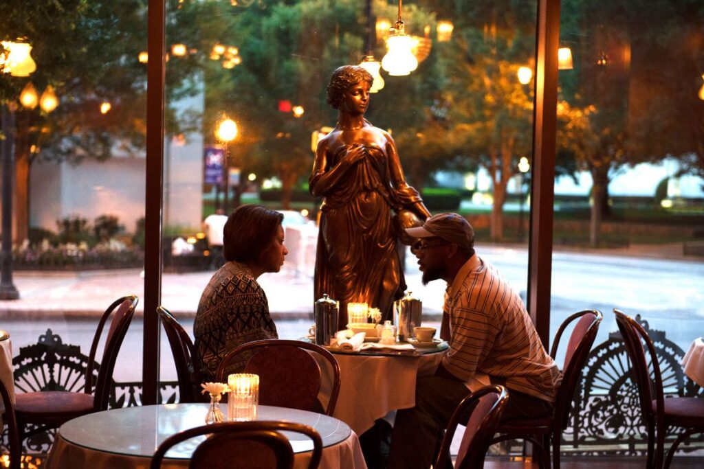 Man and woman deep in conversation at Cafe Intermezzo
